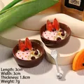 Miniature resin dessert fridge magnet with pink cream toppings and tiny silver spoon - Pink Jam Salad