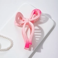 Detail of pink gradient ribbon hair claw clip with matte finish and pearl accents - Gradient Glossy Pink