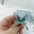 Elegant gold butterfly brooch with blue gradient wings and sparkling crystal accents - Violet Blue Butterfly