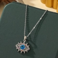 Collier avec pendentif oeil maléfique argenté, oeil bleu et pierres pavées colorées - A16-argent