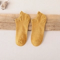 Calze corte in cotone giallo zenzero con polsini a costine su legno naturale - Taglia unica / Giallo zenzero