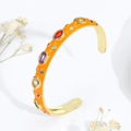 Orange enamel open cuff bracelet with colorful zircon inlay and golden metallic finish - Orange