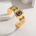 Vintage C-förmiges Edelstahlarmband mit 18K Goldbeschichtung, schwarzem Harz und Goldfolie - Goldener Retro-Stil mit schwarzer Basis und Goldfolie