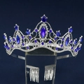 Close-up of luxury bridal crown with large blue crystals and sparkling rhinestones - Silver Royal Blue
