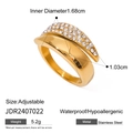 Close-up of golden stainless steel ring with multi-row zirconia insets and open adjustable band - Wide Surface Open Zircon Style (JDR2407022) / Gold