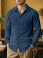 Detail of blue corduroy men shirt with texture fabric and double chest pockets - S / Navy Blue