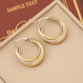 Close-up of dual-tone geometric hoop earrings with textured diamond patterns on a box - Rhombus Pattern Style (5#)