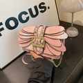 Pink snake skin patterned chain bag with pearl studs and layered wing design - Pink