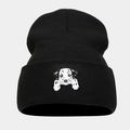 Close-up of a black knitted beanie featuring a detailed dalmatian dog head embroidery - Dalmatian - Black