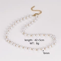 Detailed view of pearl necklace with gold chain showing length 42+5cm and 6mm pearl size - 6mm