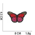 Detail of red and magenta butterfly embroidery patch with dimensions 8cm x 4.5cm on white - No.15 Red Pink Butterfly