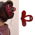 Elegant heart-shaped hair claw clip in deep red glossy resin for women's hair styling - Burgundy