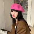 Stylish bright pink wool beret hat paired with a brown striped cardigan for women - M (56-58cm) / Pink