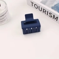 Detail of a navy blue matte square hair claw clip with a hollow rectangular design - 5cm / Navy Blue