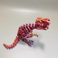 Detail of red 3D printed Tyrannosaurus Rex skull model with metallic finish and joints - Large / Red Gold Purple