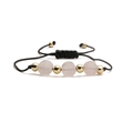 Detail of adjustable black woven bracelet with pink stone beads and gold spheres - Rose Quartz