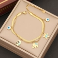Bracciale a doppio strato in acciaio inossidabile dorato con ciondoli occhio e elefante - Stile Elefante Pesce e Stella (5#)
