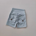 Detail of high waist peach lift shorts with back pockets and decorative buttons - S / Sky Blue