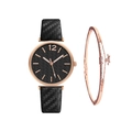Close-up of rose gold watch with leaf-patterned black dial and matching star bracelet - Black + Bracelet