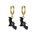 Detail of golden hoop earrings with black bat pendants and smiling face for Halloween - Black Bat Style