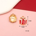 Macro shot of 15mm Christmas gift box pendants with red enamel and rhinestone details - Christmas Gift Box Style 3 (With Rhinestone)