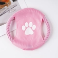 Pink cotton rope dog frisbee with white paw print detail on a soft lifestyle background - Pure Pink