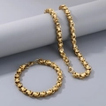 Detalle de conjunto de collar y pulsera de cadena bizantina dorada para hombres - Collar / Dorado
