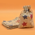 Star pattern cotton linen drawstring sachet pouch in red and blue on orange background - Pentagram