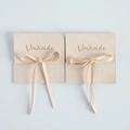 Elegant beige microfiber jewelry pouch with a matching silk ribbon bow and velvet texture - Beige