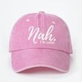Close-up of embroidered white lettering Nah I'M GOOD on pink washed cotton baseball cap - Pink