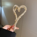 Pinza per capelli in metallo dorato a forma di cuore con finitura martellata - Cuore Traforato Oro