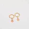 Elegant gold drop earrings featuring a pear-shaped pink crystal birthstone pendant - October/Pink