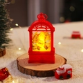 Cozy red Christmas lantern night light featuring Santa Claus glowing on a wooden base - Red Santa Claus