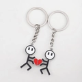 Kreatives Strichmännchen-Paar Schlüsselanhänger Set mit einem geteilten roten Herz - Strichmännchen Schlüsselanhänger (1 Paar) / Silber