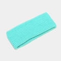 Close-up of mint green knitted headband with vertical ribbed texture for sports use - M / Teal