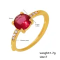Adjustable stainless steel ring with 7mm red zircon stone and gold plated finish - US 7 / Gold Rose Red Zircon (A121)