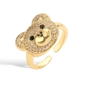 Macro detail of golden teddy bear ring featuring micro-pave colorful crystals and open band - Gold White Zirconia (Bear Head Style)