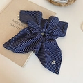 Detail of dark blue polka dot hair scrunchie with streamers and handmade label - Streamer Bow Style / Dark Blue