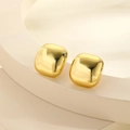 Minimalist geometric gold square stud earrings with polished mirror finish on a pedestal - Gold Rounded Square