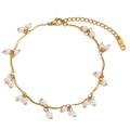 Collana a spirale placcata in oro 18K con perle d'acqua dolce e piccole sfere dorate - Cavigliera Con Ciondolo Di Perle E Nappa Articolata - Oro
