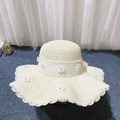 Women's cream straw sun hat featuring elegant faux pearls and decorative 3D flowers - Wavy Brim Style / Creamy White