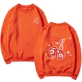 Vibrant orange crewneck sweatshirt featuring Cherry Bomb and Lucky 8 graphic prints - Orange