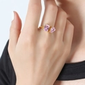 Gold plated open ring with rectangular and pear cut pink zircon stones on model's hand - Size 7/Adjustable / Gold Pink Crystal Zircon