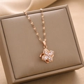 Collana a quadrifoglio rotante in oro rosa con zirconi su scatola per gioielli - Oro rosa