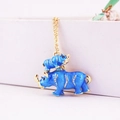 Sparkling blue enamel rhino keychain with rhinestone inlay and gold finish metal chain - Lake Blue