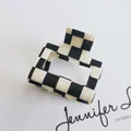 Detail shot of a minimalist black and white checkerboard hair claw clip with a glossy finish - 25# Black and White Plaid Hair Claw Clip