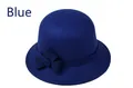 Close-up of royal blue wool cloche hat featuring a side bow detail for women - M (56-58cm) / Blue