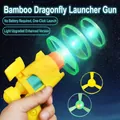 LED flying disc toy gun in bright yellow and green colors with easy one-click launch feature - Glow 3-Disc Saucer Gun