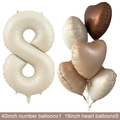 Detail of cream 40 inch number 8 balloon with matching heart shaped party decorations - Creamy Number 8 / Number And Heart Balloon Combination