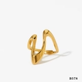 Adjustable golden stainless steel ring featuring a modern irregular wavy geometric design - Minimalist Wave Streamline Style (Gold K578)